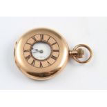 A gold plated A. W. W. Co. Waltham crown wind half hunter pocket watch, the white enamel dial having