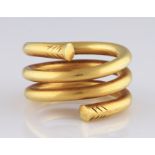 An ancient Greek gold hair spiral ring, circa 7th Century BC, the terminals being slightly flared