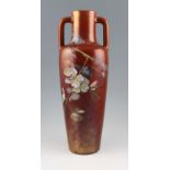 An early 20th Century Clement Massier Golfe Juan earthenware twin handled vase with hand painted