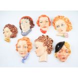 A group of seven Art Deco ceramic female wall plaques to include; Beswick model number 8205, Peggy