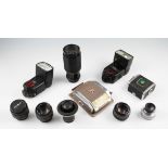 A quantity of assorted camera photography equipment to include; two Canon flash units, Linhof 6cm by