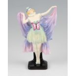 A Royal Doulton figure ‘Butterfly’ HN 1456 wearing green, pink and lilac dress with black base,