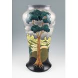 A Moorcroft pottery limited edition vase of shouldered form in After The Storm pattern by Walter