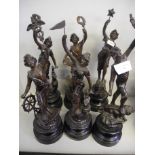 Six spelter figurines.