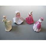 A group of four Coalport figures, The Garden, Valentine Debutante, Debutante Congratulations, Amy.