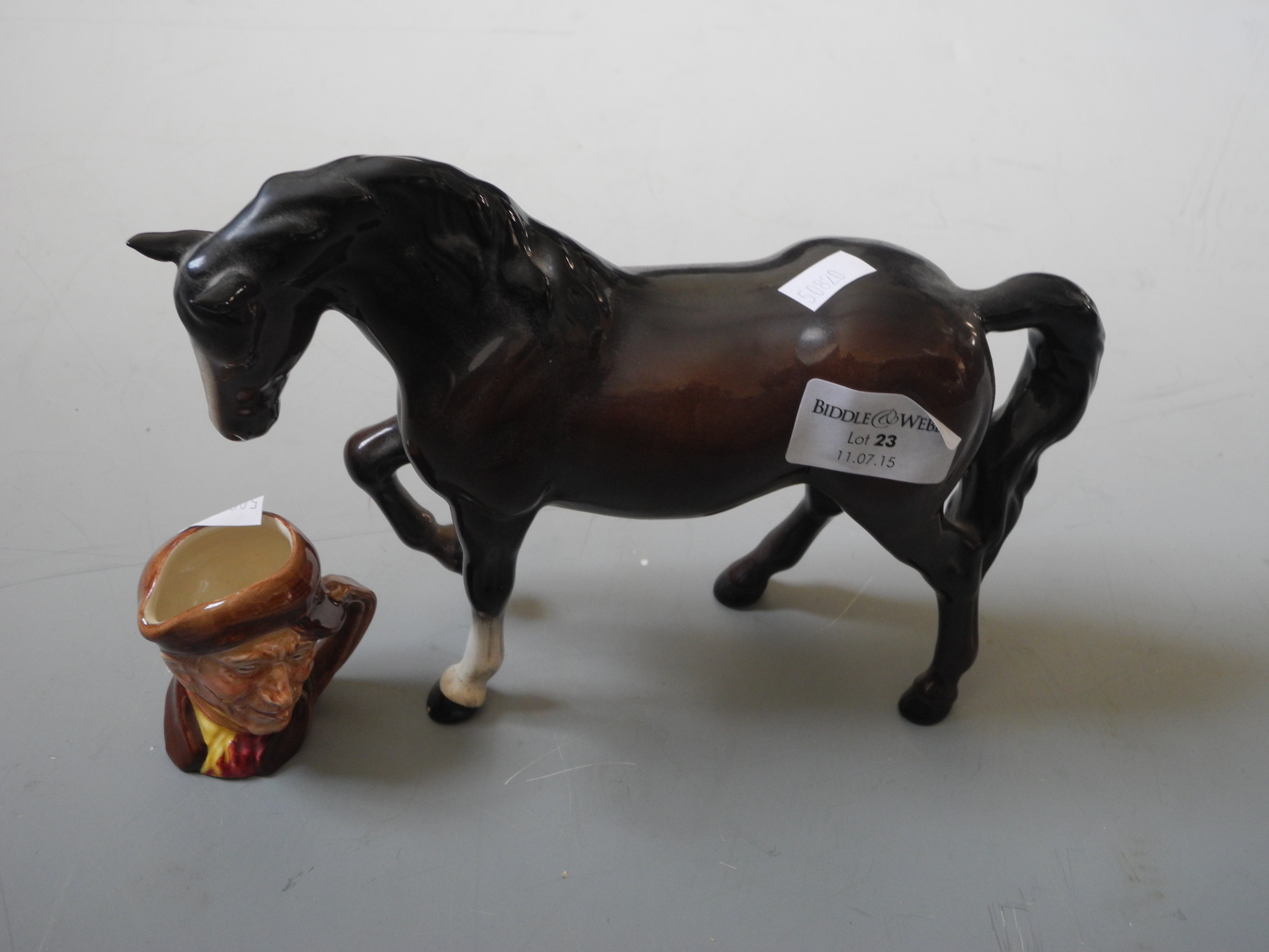 A Royal Doulton figure of a horse and a small jug.
