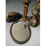 An Art Nouveau style mirror together with three female figurines.