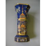 A Carlton Ware blue and gilt patterned vase with Persian decoration.