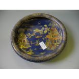 A Carlton ware blue and gilt patterned bowl with Chinese decoration.