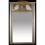 A 19th Century French mirror with ornate gilt foliage decoration and floral central top design