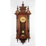 A Victorian mahogany cased hanging wall clock with brass coloured dial having Arabic numeral markers