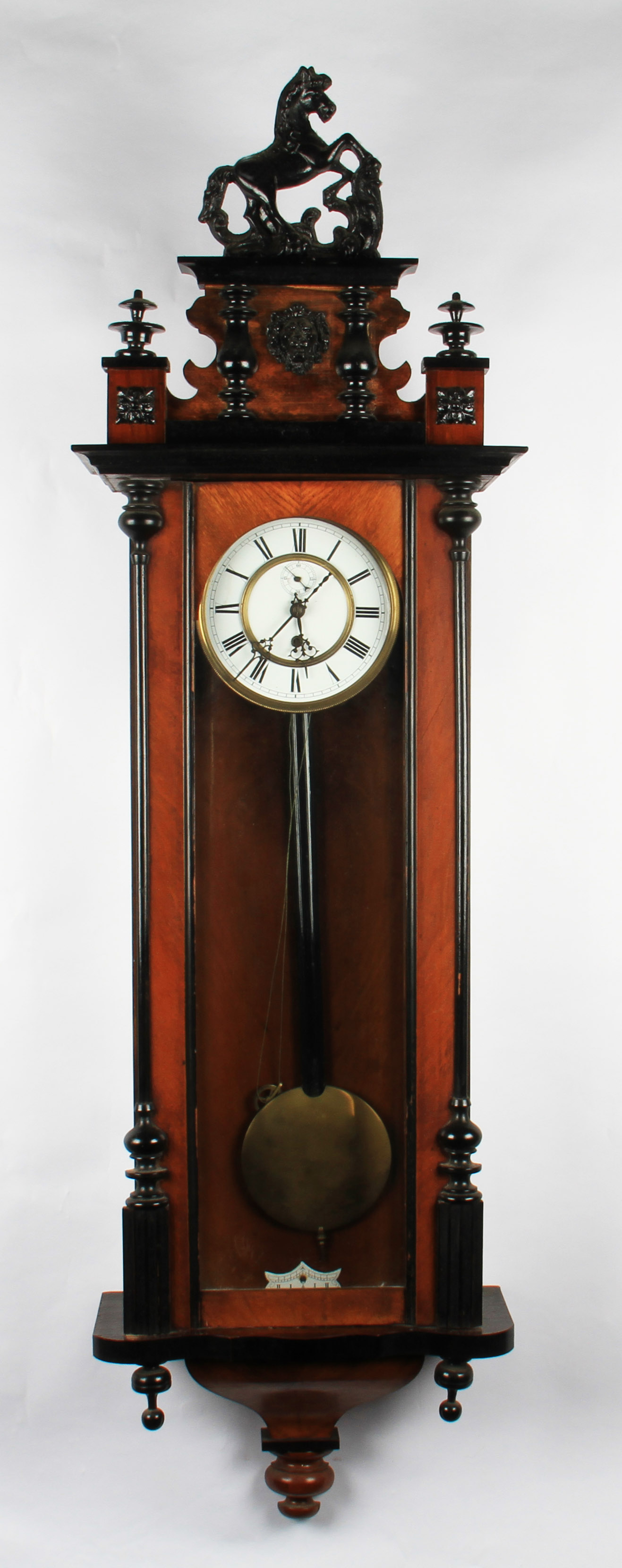 A Victorian walnut veneered cased hanging wall clock with white dial with hourly Roman numeral