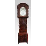 A 19th Century flame mahogany long case clock, the face having a figural design to the corners