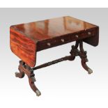A 19th Century Georgian mahogany sofa table fitted with two drawers and two false drawers, with