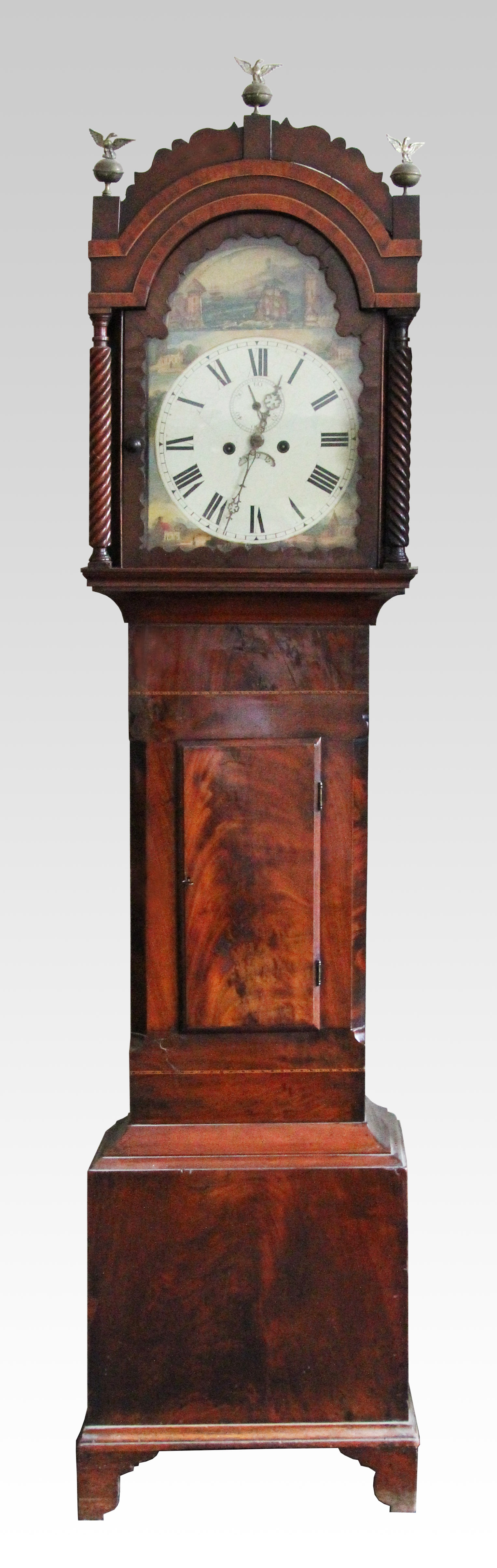 A 19th Century mahogany long case clock, the head having twist carved pillars with shaped domed