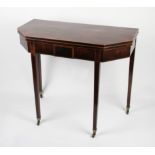 A 19th Century mahogany fold over tea table with octagonal shaped top with inlaid string beading