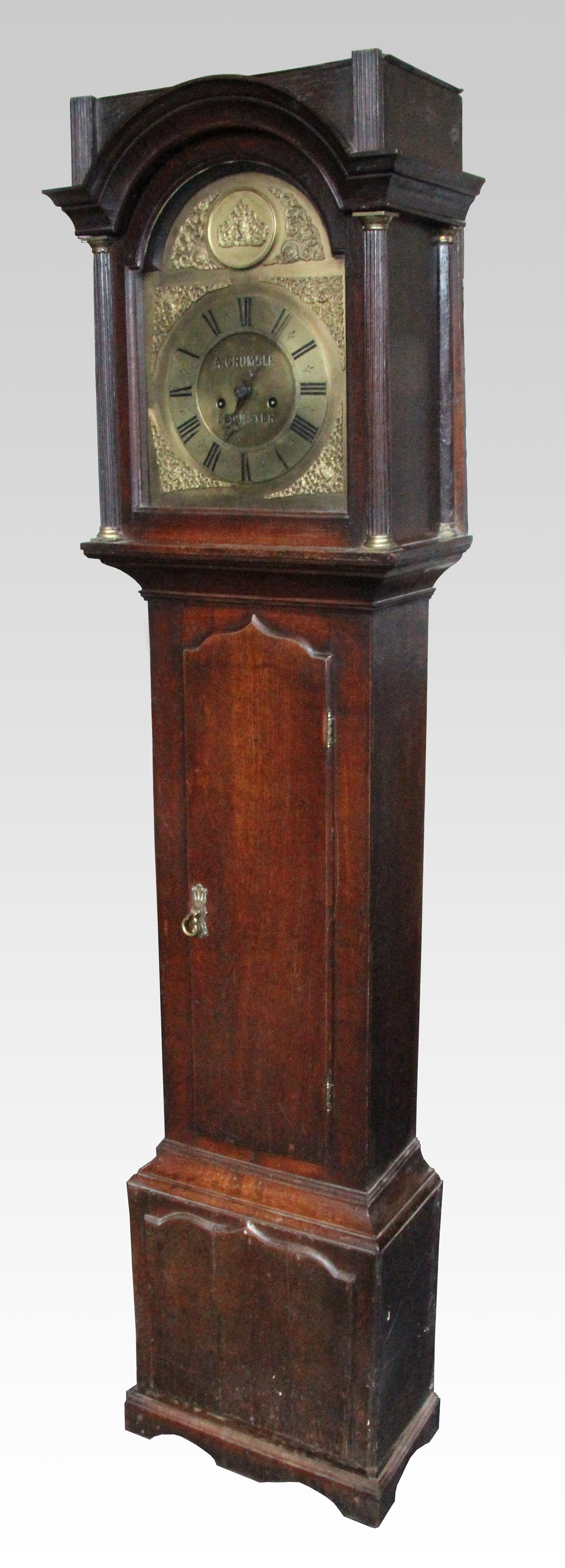 A 19th Century oak long case clock, with pie crust topped front panel and door with two column