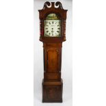 A 19th Century oak and mahogany long case clock, the head having turned pillar supports with swan