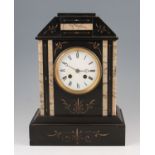 A 19th Century French slate and marble mantel clock with angular design case with gilt coloured