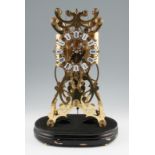 A 20th Century 8 day brass bodied skeleton clock with twin weight pendulum movement having an open