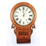 A Victorian mahogany American style hanging wall clock with carved sides and front window, the white