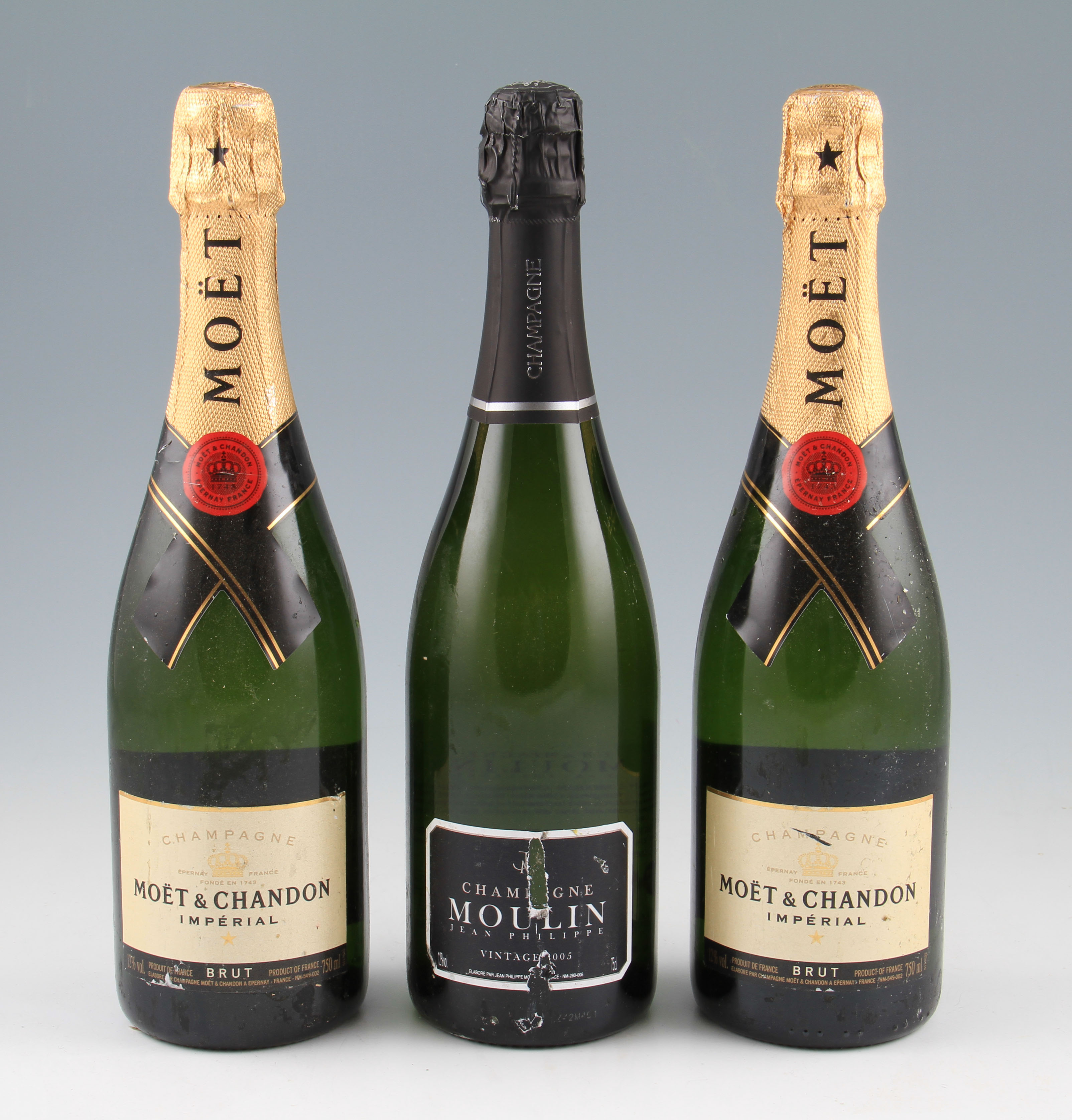 *3 bottles of Champagne. 2 Moet NV & 1 Moulin 2005 Vintage.