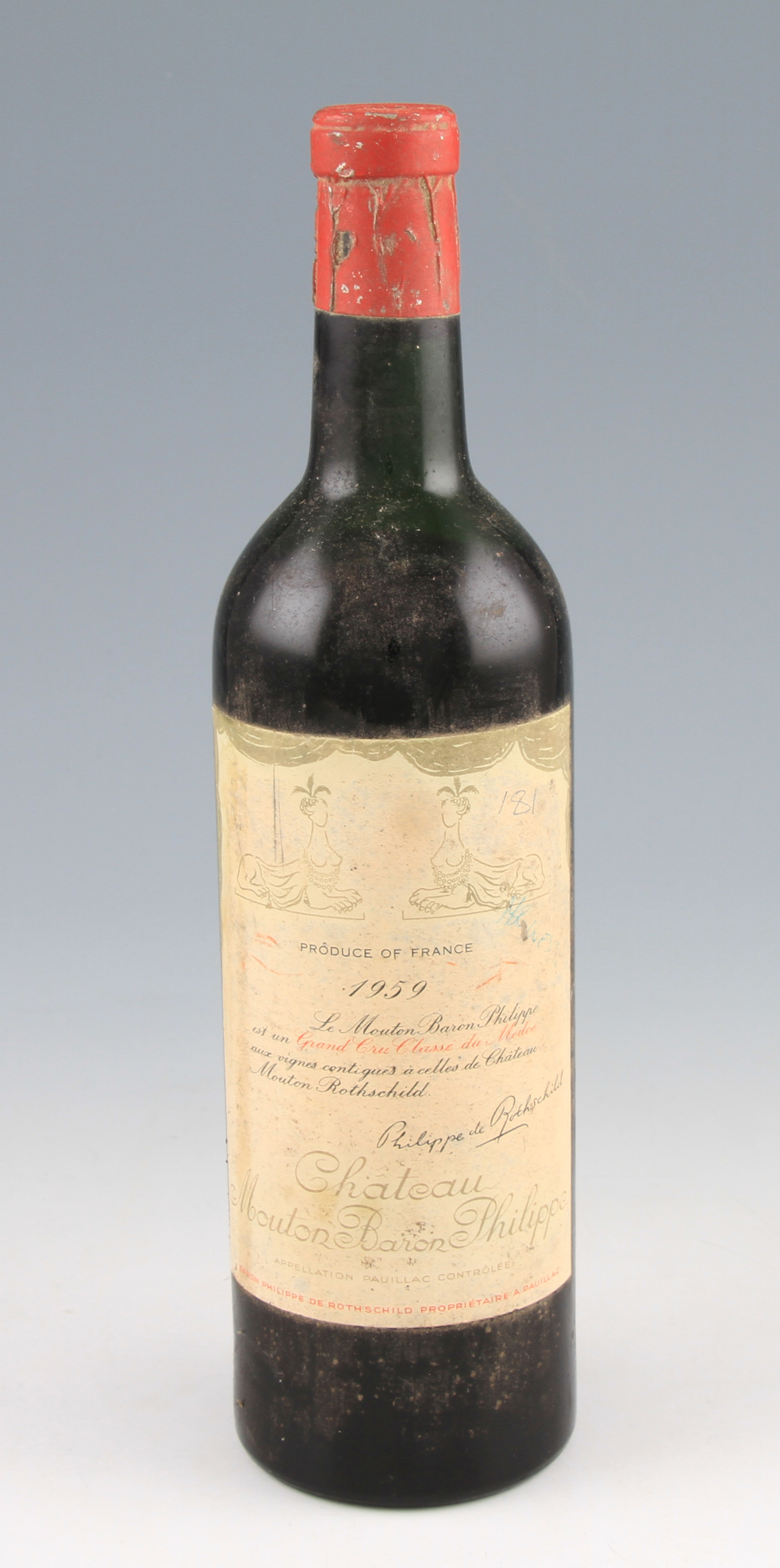 Chateau Mouton Rothschild 1959. Mid shoulder fill level. Good label and capsule.