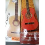 Two boxed classical guitars.