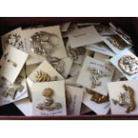 A collection of 81 assorted military cap badges including; Royal Scots, Gloucesters, Royal Irish,