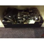 Lot to include an assortment of household items including silverware and metal containers,