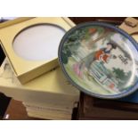 A large quantity of collectible plates to include a selection of oriental designs.