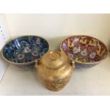 Two cloisonne bowls and a gilt tea pot with oriental decoration.