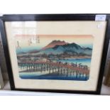 Two framed and glazed Japanese prints.