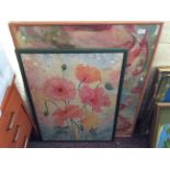 A large, framed abstract painting and a large framed print of flowers.