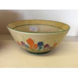 A hand painted Clarice Cliff ceramic bowl with Crocus floral decoration.