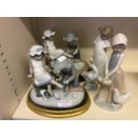 A Spanish Lladro figure sets, depicting a young girl trying on shoes, with cushioned bases, a maid