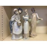 Three Spanish Lladro figurines.