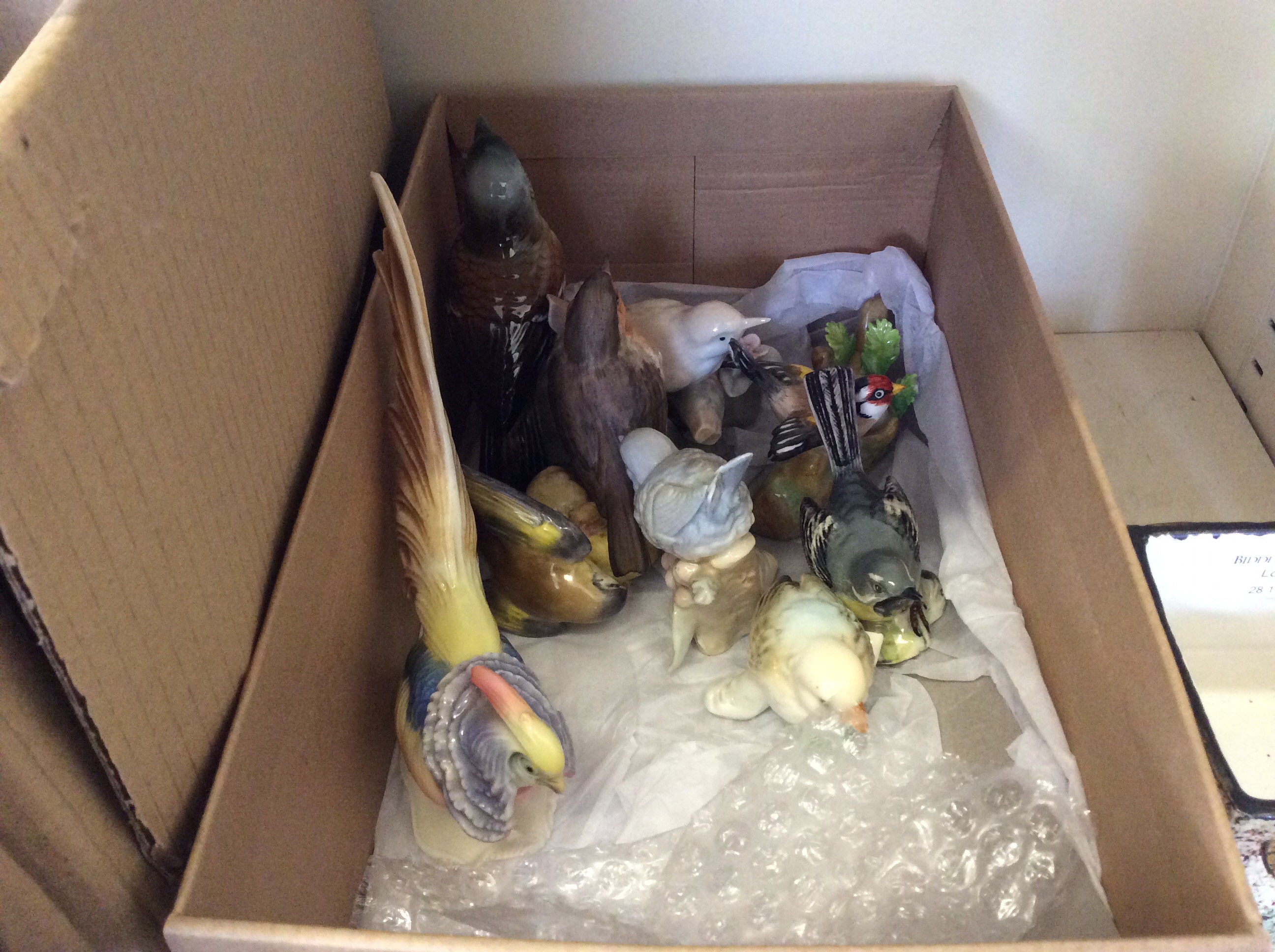 Lot to include a selection of ceramic ornamental birds with various brands, Beswick, Germany etc.