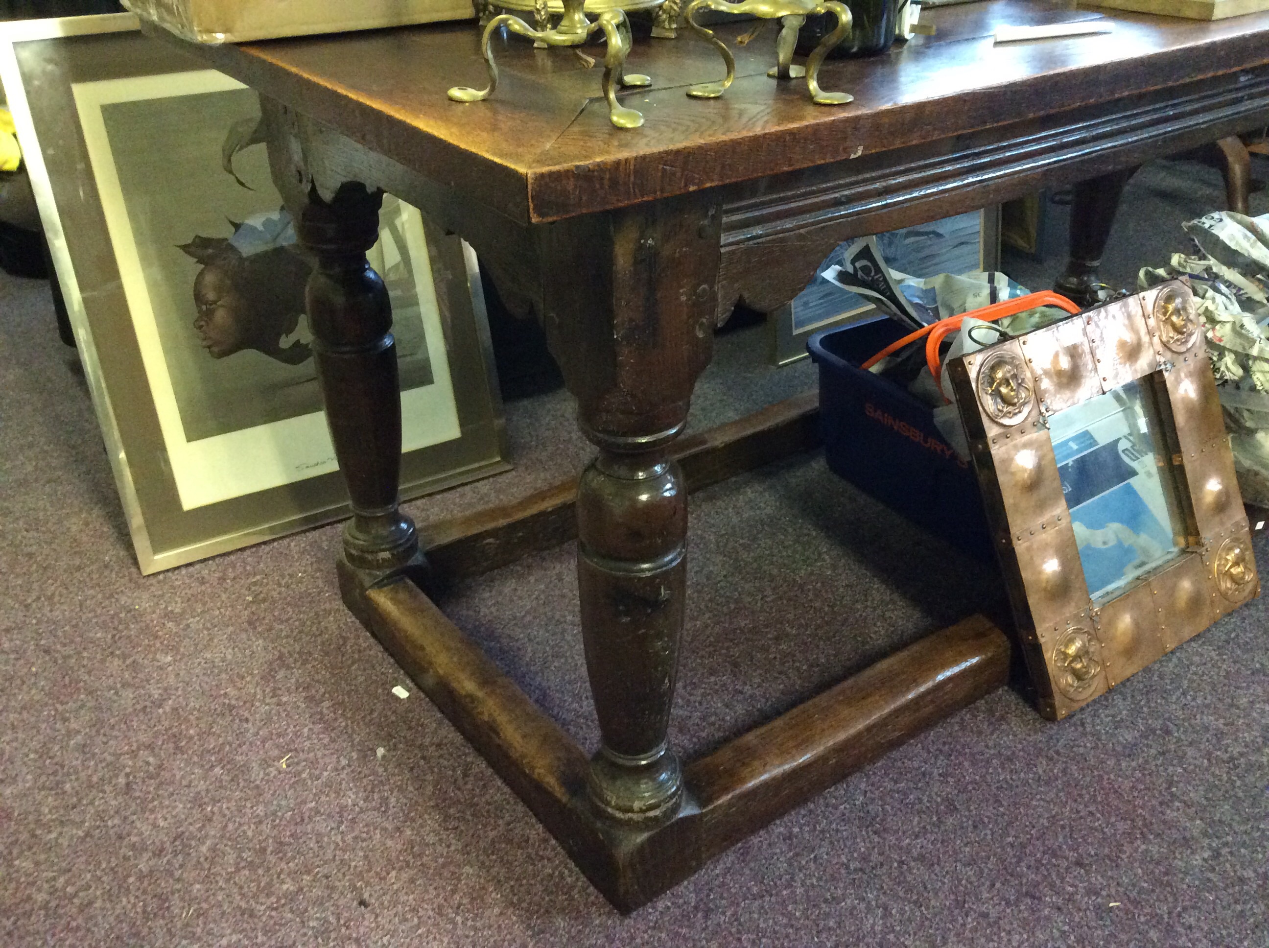 An oak refectory style dining table.