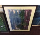 A large framed print of a landscape, signed.