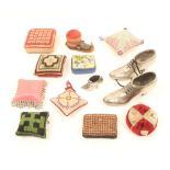 Thirteen pincushions, larger format, comprising; a pair of soft metal brogue style lady's shoes,