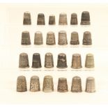 Twenty four thimbles, most hallmarked, all with holes or damage.  (24)