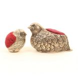 Two bird form white metal pincushions, comprising; a silver chick with London hallmark and 925