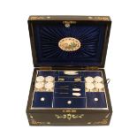 A mid-Victorian rectangular sewing box, the ebonised ground inlaid to the lid and front with