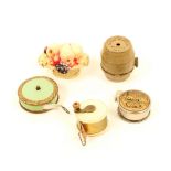 Five tape measures, comprising; a plastic basket of fruit, 6cm, a metal barrel "Wm. Youngers -