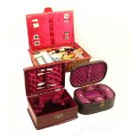 Three Victorian sewing boxes, comprising; a rectangular red leather covered example with handle to