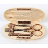 A 19th century ivory cased sewing set, the ivory case of rounded end rectangular form, monogrammed