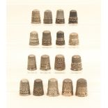 Seventeen mainly English silver thimbles, including two Royal Spa, two with thistle borders, and