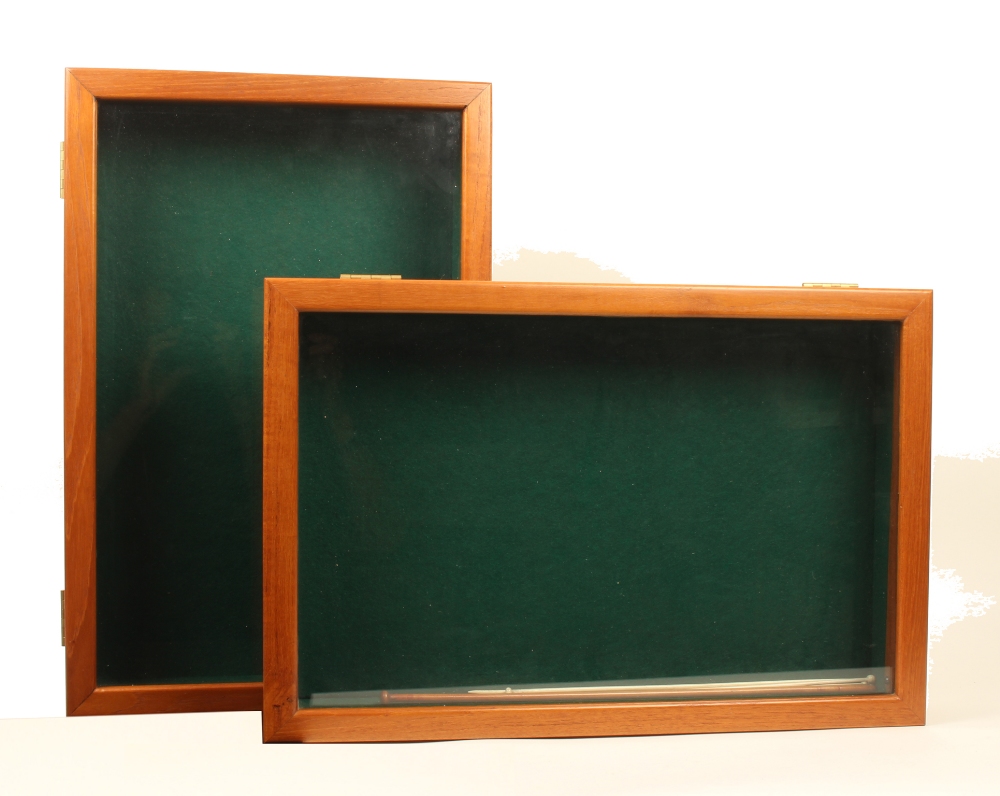 A pair of modern purpose-built counter display cases for sewing tools, in teak finish, glazed hinged