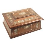 A mid-19th century rosewood and cut mother of pearl sewing box of sarcophagus form, the lid with